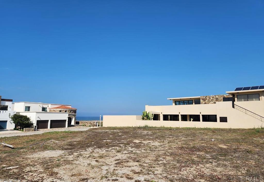 Punta Piedra Baja Mexico, CA 22765 - Photo 4 of 9 a white building with a big yard