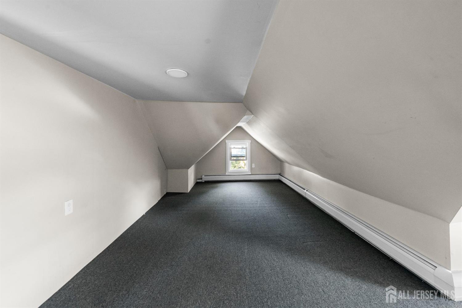 1237 South 10th Street South Plainfield, NJ 07080 - Photo 22 of 23 a view of an empty room with stairs