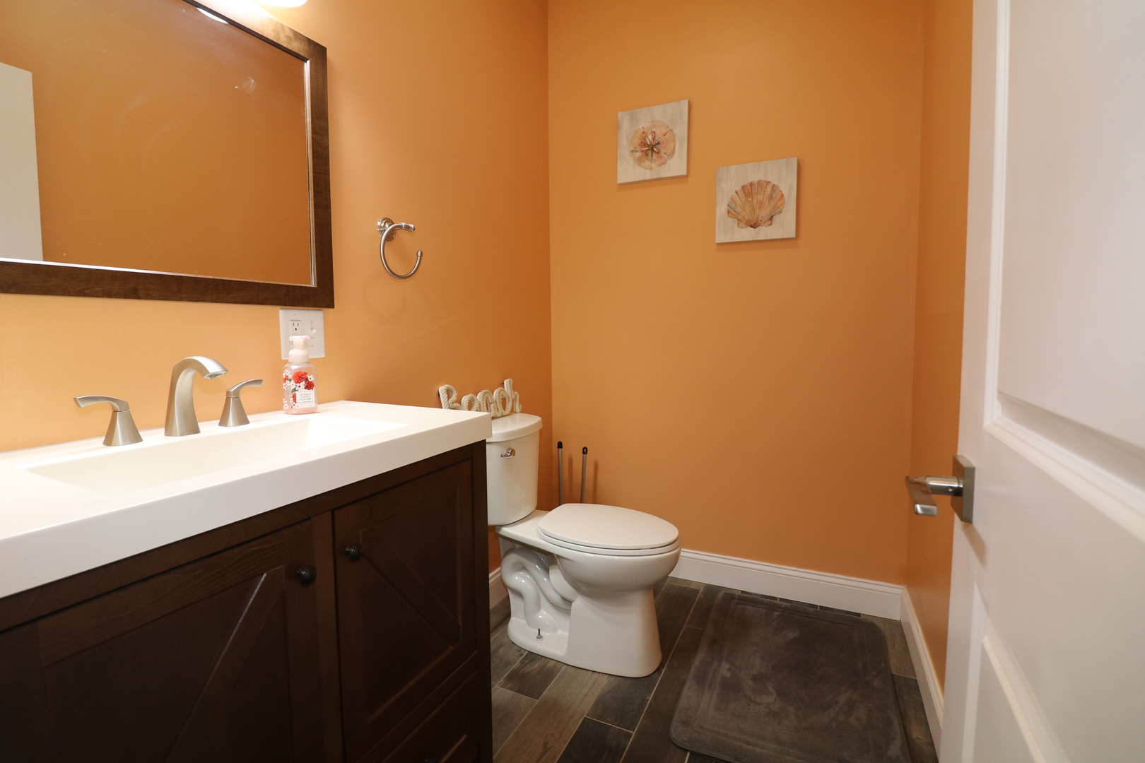10865 Lake Road Dewitt, IL 61735 - Photo 6 of 35 a bathroom with a sink and a toilet