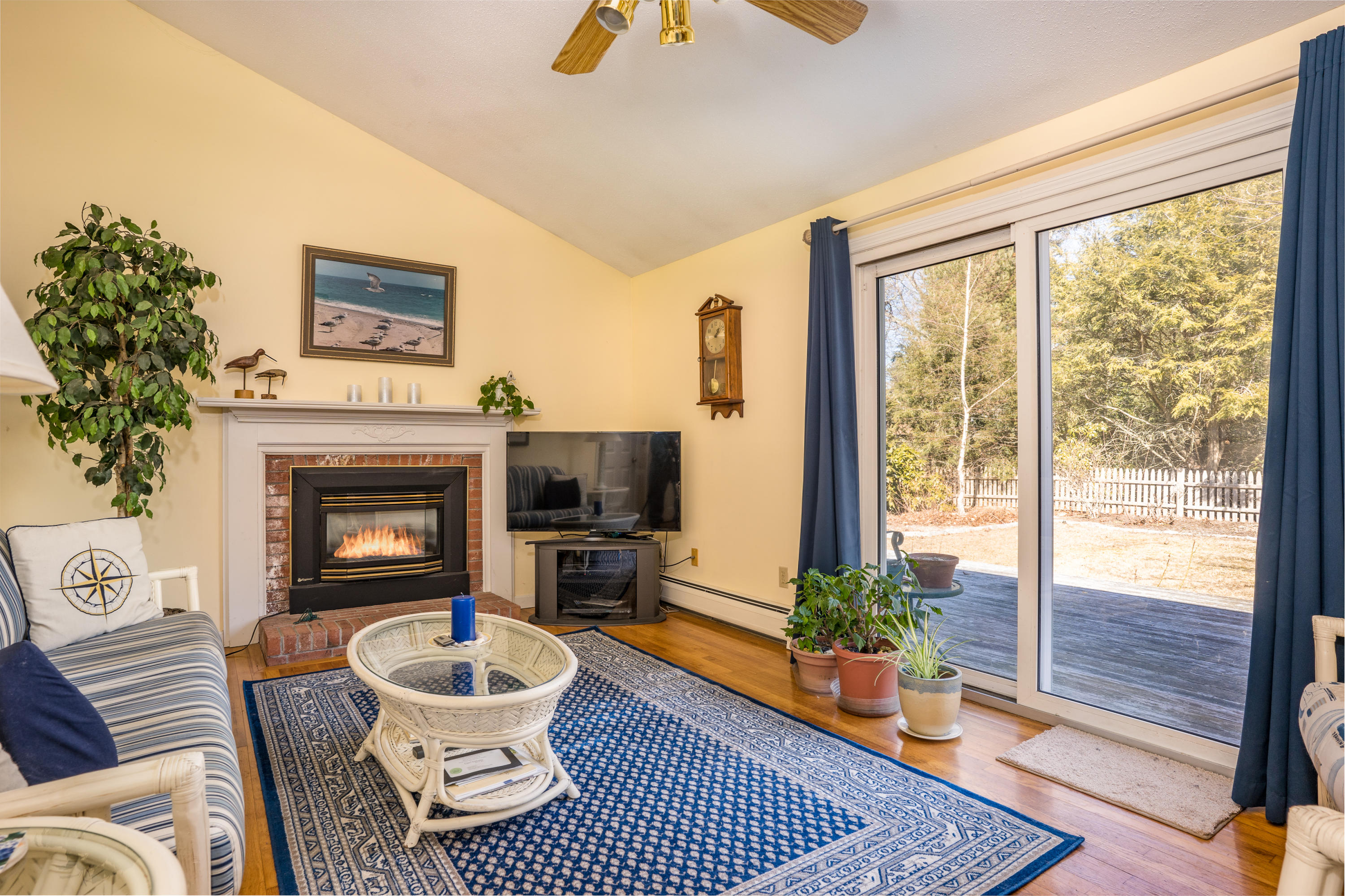 8 Black Valley Road Centerville, MA 02632 - Photo 5 of 15 a living room with furniture and a fireplace