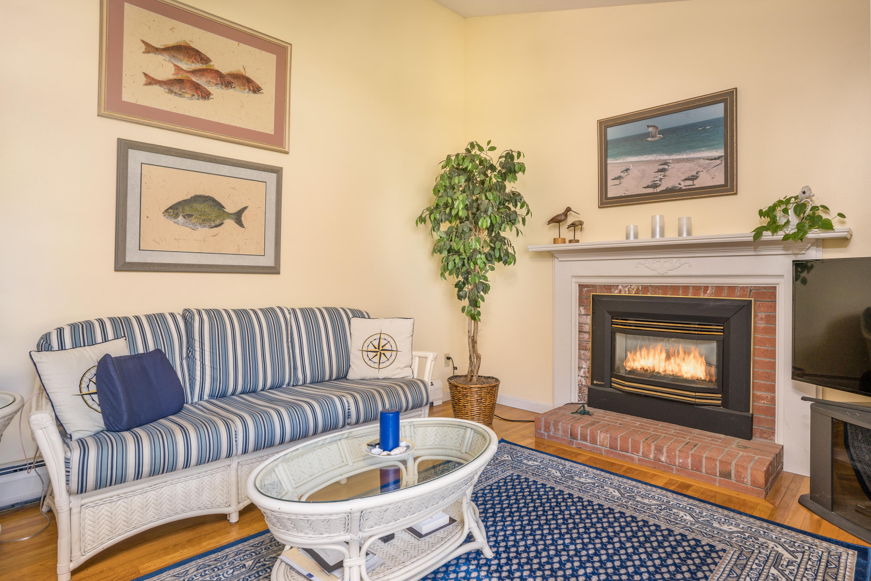 8 Black Valley Road Centerville, MA 02632 - Photo 6 of 15 a living room with furniture and a fireplace