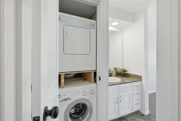 a utility room with dryer and washer
