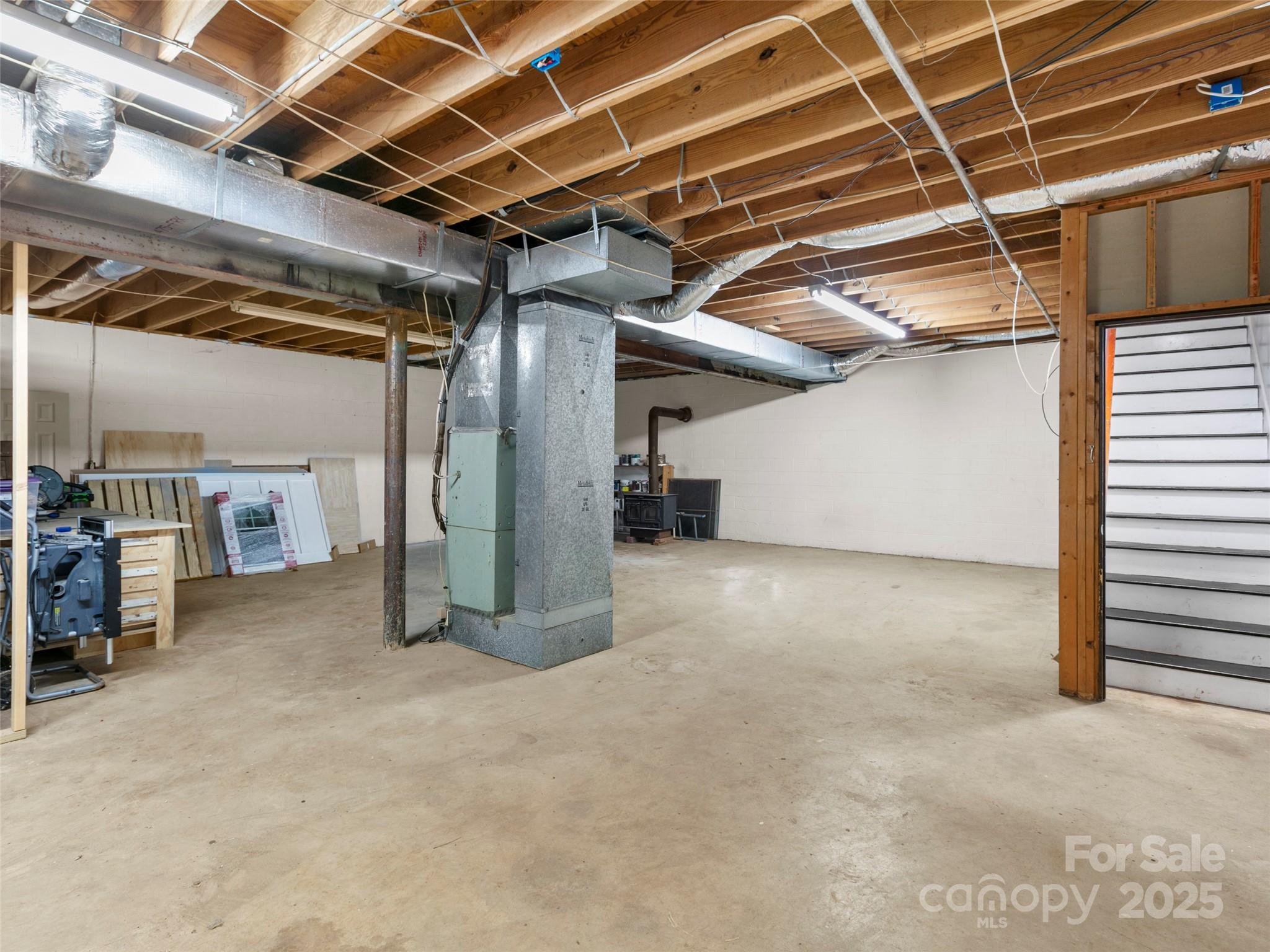 373 Vineyard Road Tryon, NC 28782 - Photo 28 of 46 a view of empty room with wooden ceiling