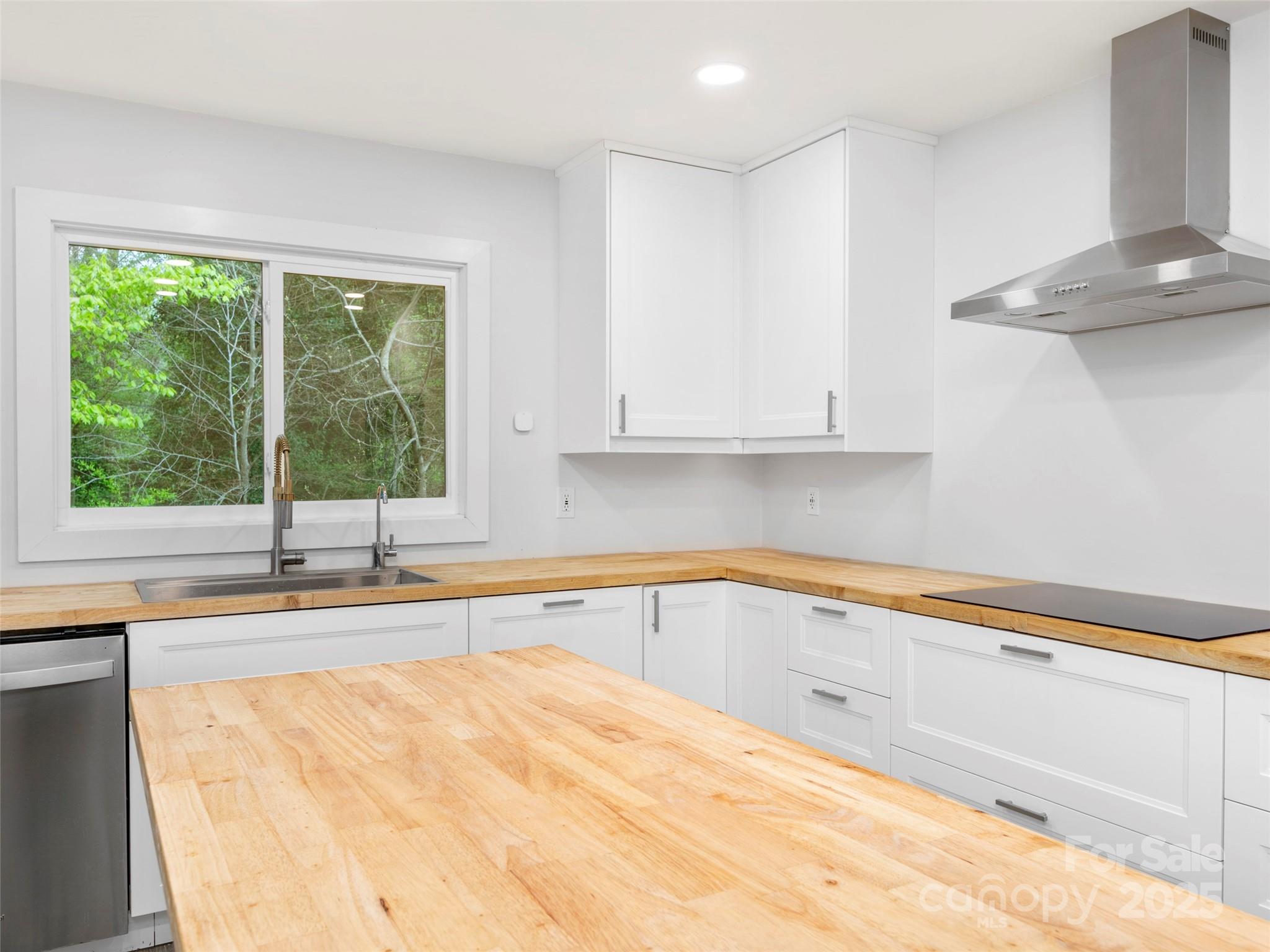373 Vineyard Road Tryon, NC 28782 - Photo 9 of 46 a kitchen with a sink and a window
