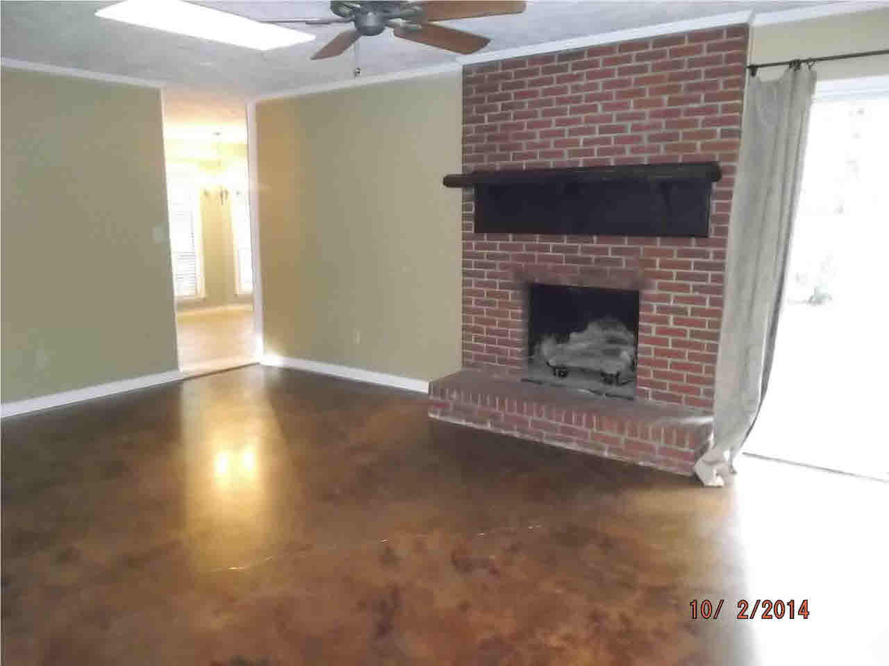 Den with Fireplace & Sky LIght