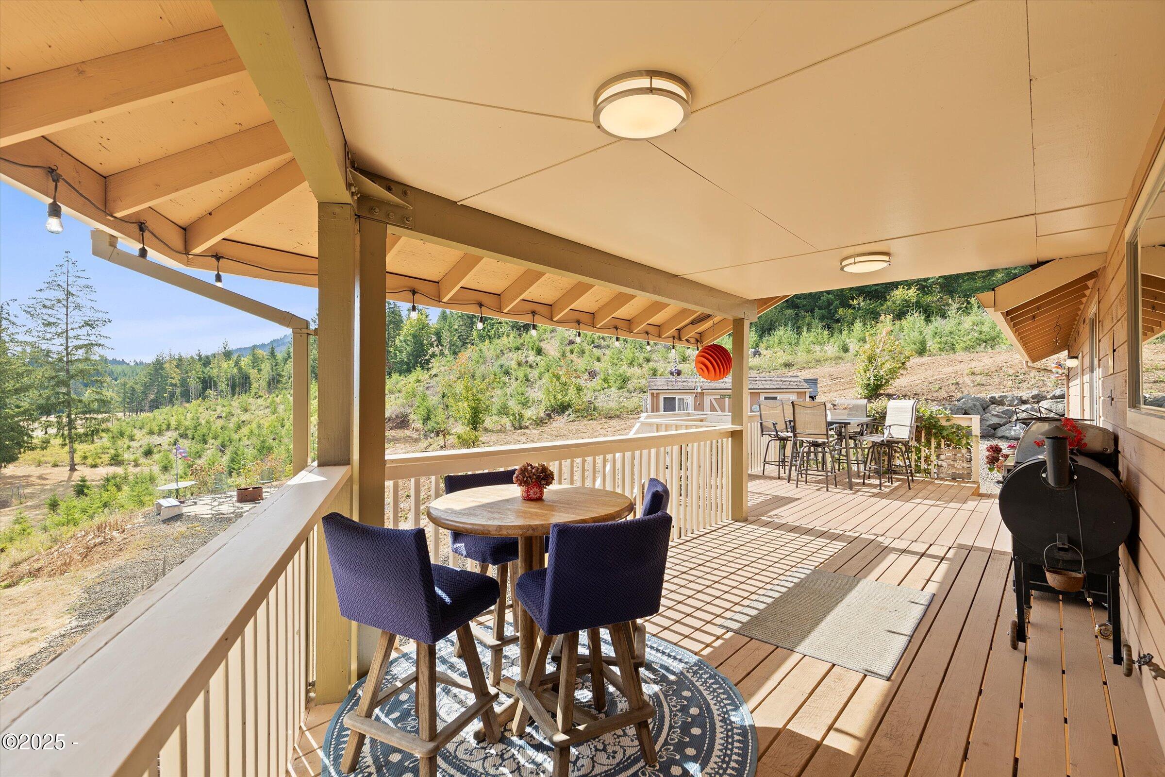 21560 Gooseneck Road Sheridan, OR 97378 - Photo 58 of 63 a view of a dining room with furniture window and outside view