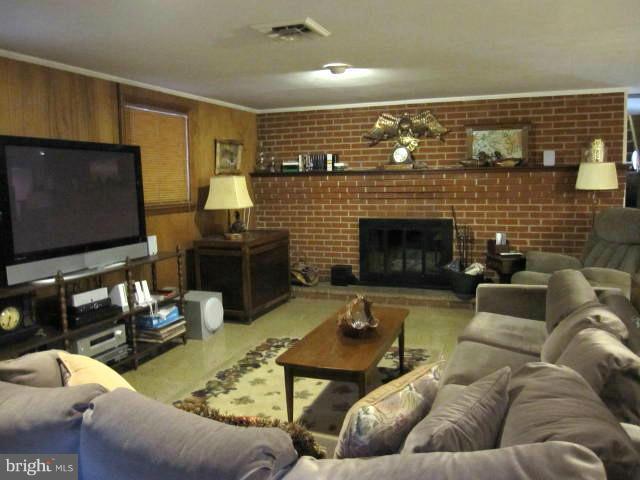 4801 Wood Road Temple Hills, MD 20748 - Photo 23 of 30 Rec Room with Masonry Fireplace