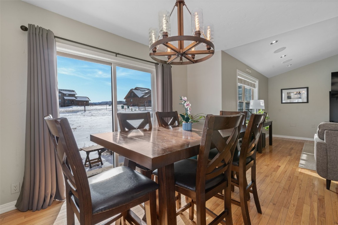 158 Oak Ridge Circle Oak Creek, CO 80467 - Photo 18 of 47 a view of a dining room with furniture window and outside view