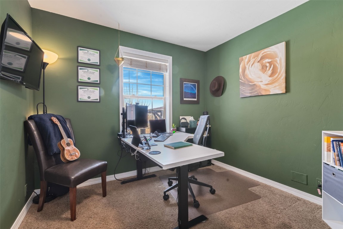 158 Oak Ridge Circle Oak Creek, CO 80467 - Photo 25 of 47 a view of a workspace with furniture and a workspace