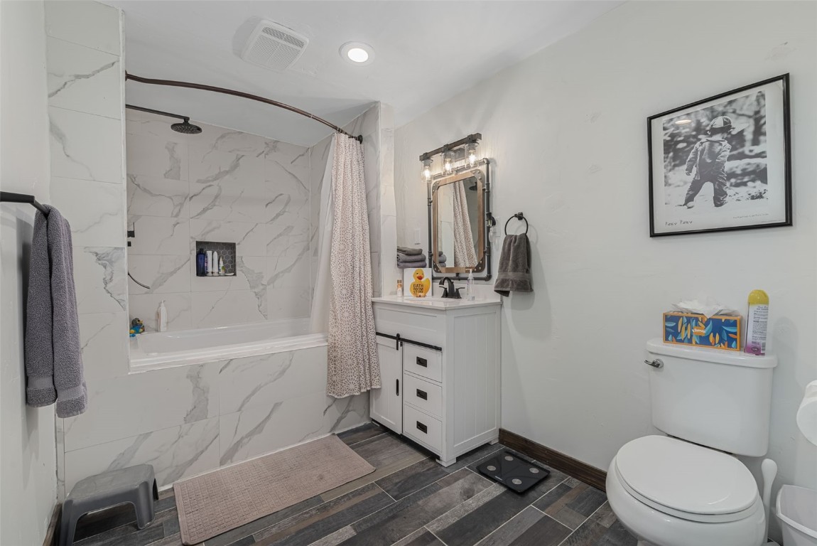 158 Oak Ridge Circle Oak Creek, CO 80467 - Photo 38 of 47 a bathroom with a toilet a sink and a shower