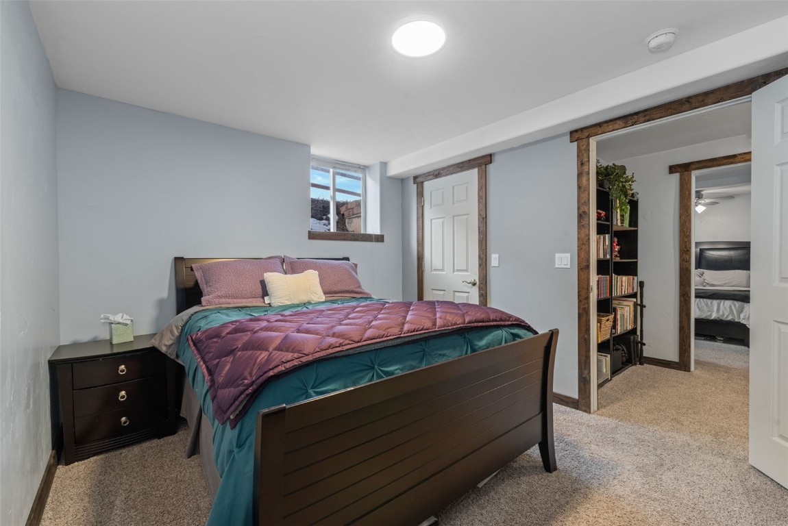 158 Oak Ridge Circle Oak Creek, CO 80467 - Photo 39 of 47 a bedroom with a bed and a cabinets