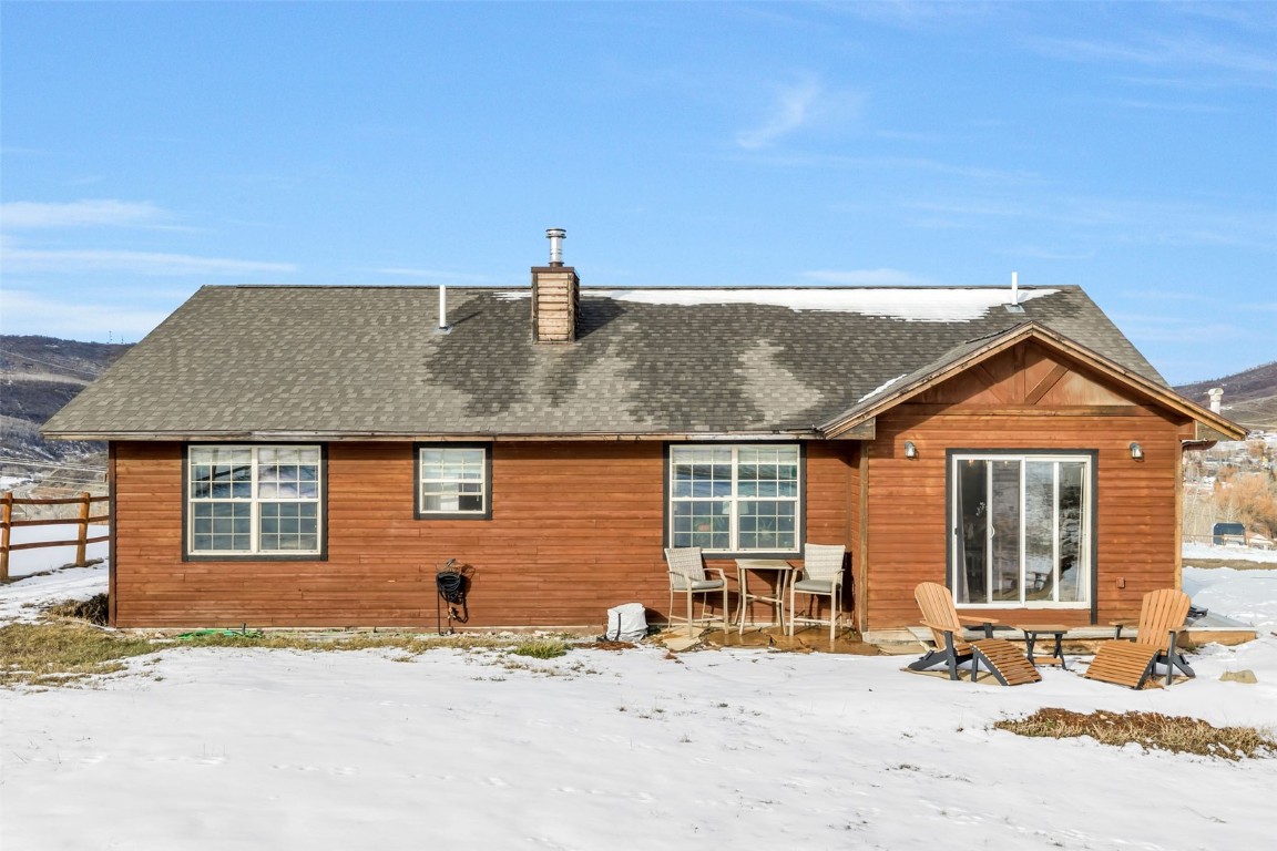 158 Oak Ridge Circle Oak Creek, CO 80467 - Photo 47 of 47 a front view of a house with a yard