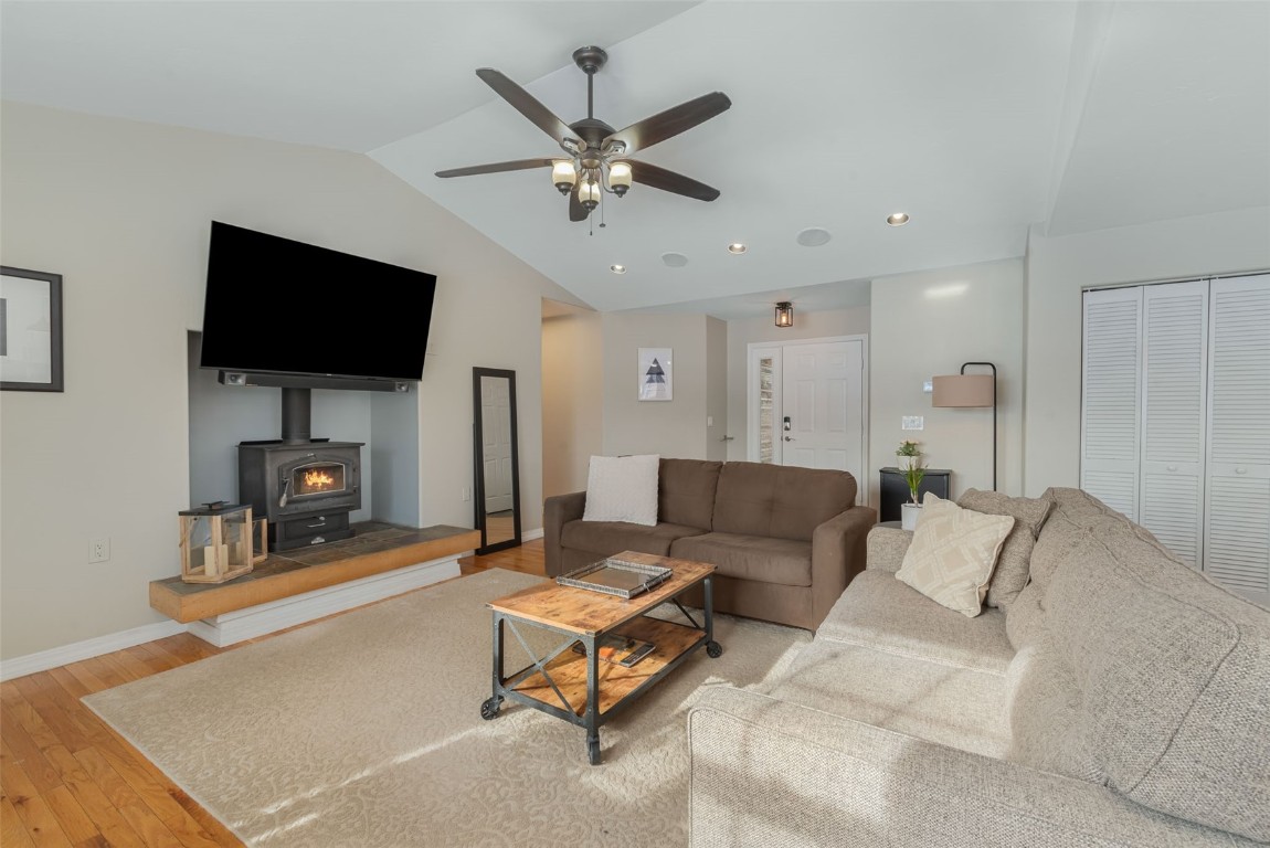 158 Oak Ridge Circle Oak Creek, CO 80467 - Photo 6 of 47 a living room with furniture and a flat screen tv
