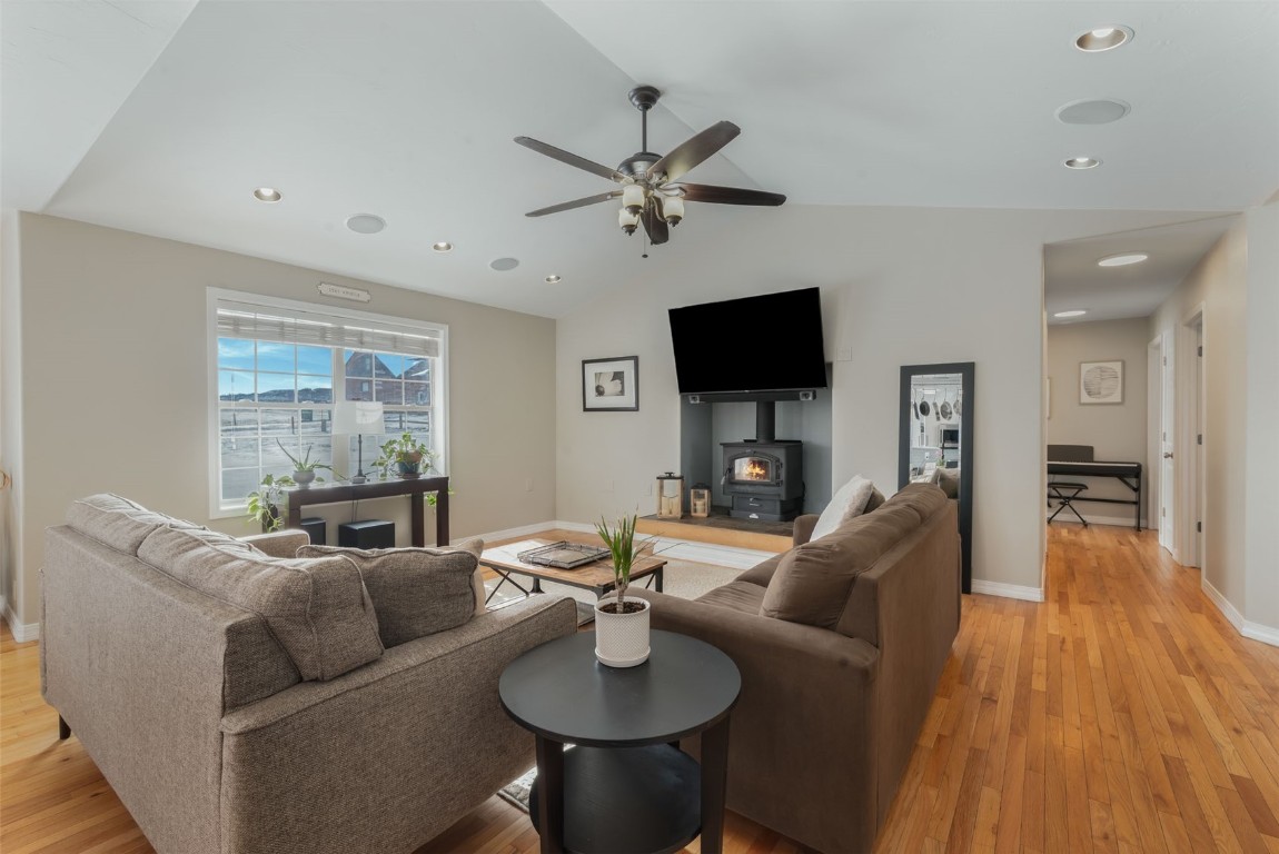 158 Oak Ridge Circle Oak Creek, CO 80467 - Photo 7 of 47 a living room with furniture a flat screen tv and a large window