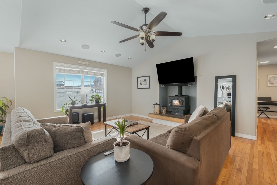 158 Oak Ridge Circle Oak Creek, CO 80467 - Photo 8 of 47 a living room with furniture and a flat screen tv with wooden floor
