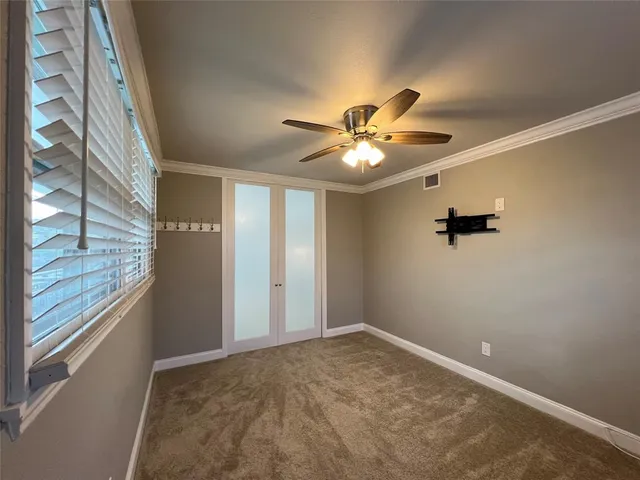 a view of a livingroom with a fan