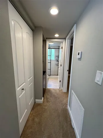 a bathroom with a sink toilet and mirror