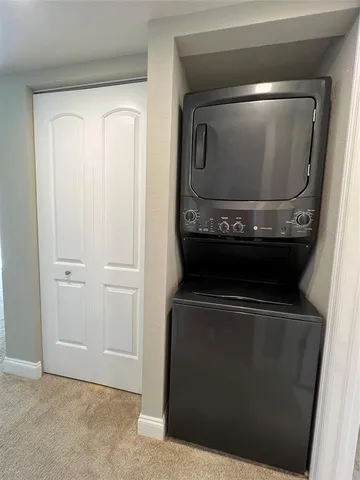 a view of front door with wooden floor