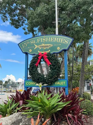 a view of a lawn chairs under an umbrella