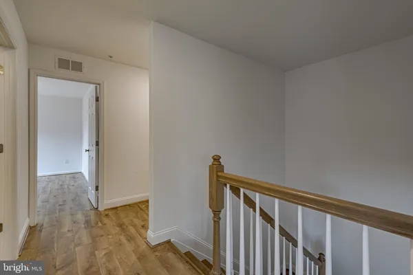 a view of entryway with wooden floor