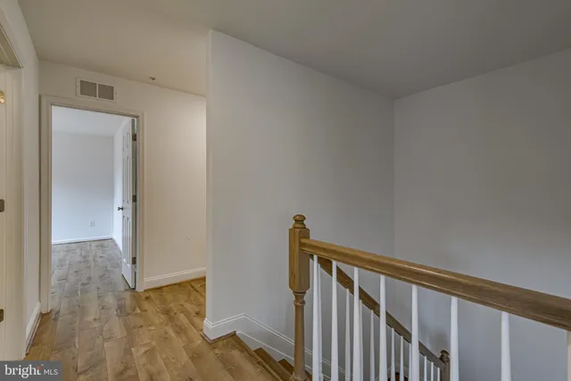 a view of entryway with wooden floor