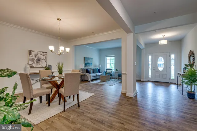 a view of a livingroom with furniture chandelier