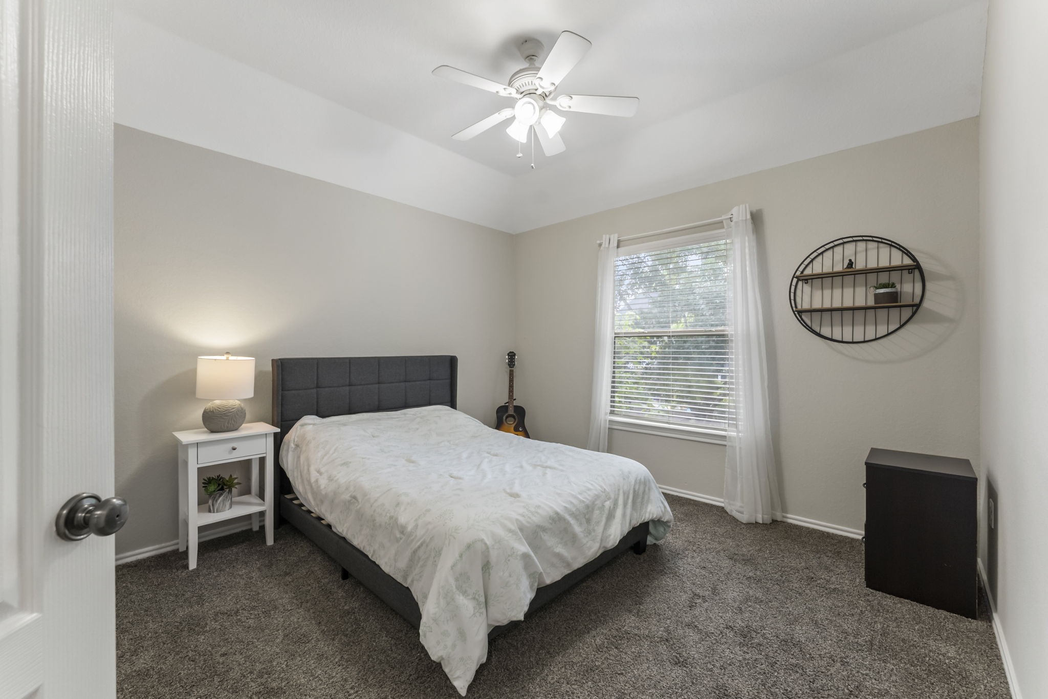 2106 Leaf Meadows Court Spring, TX 77386 - Photo 23 of 34 a bedroom with a bed and a window