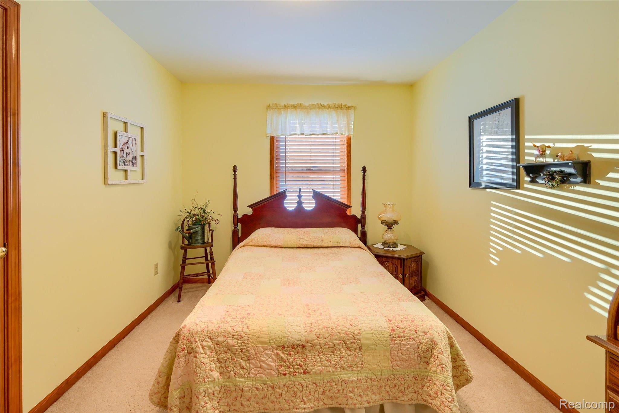 6941 North Lake Pleasant Road North Branch, MI 48461 - Photo 26 of 51 Bedroom with baseboards and light carpet