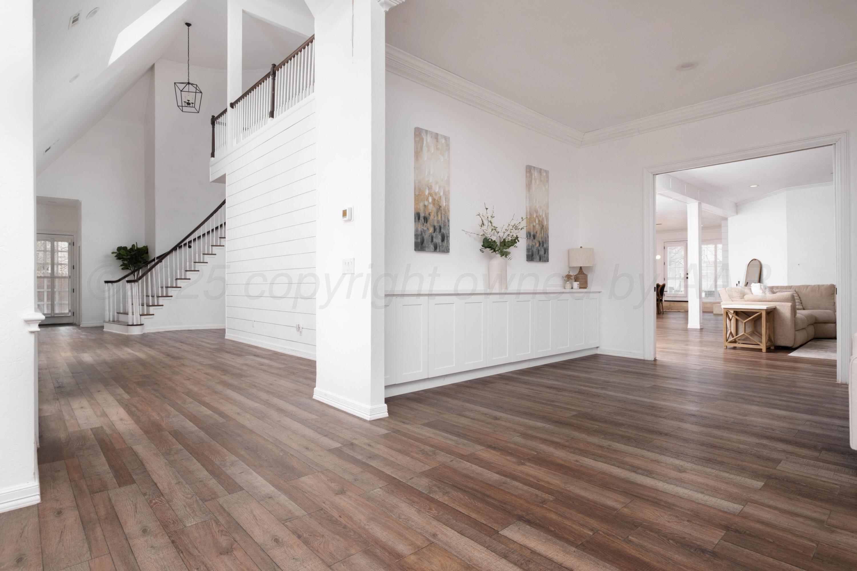 3207 Parker Street Amarillo, TX 79109 - Photo 17 of 73 a view of a living room and hardwood floor
