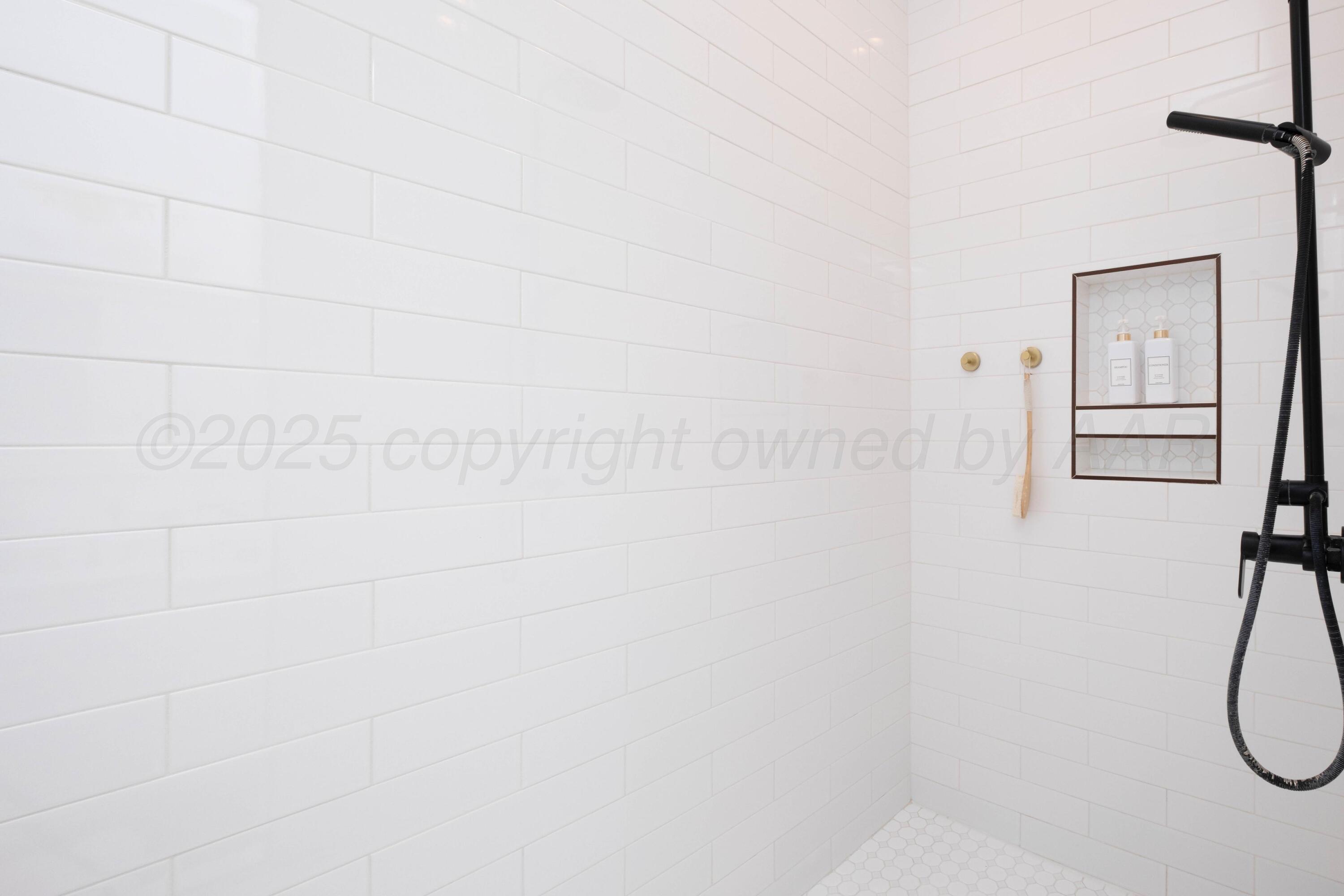 3207 Parker Street Amarillo, TX 79109 - Photo 35 of 73 a view of a bathroom with a shower