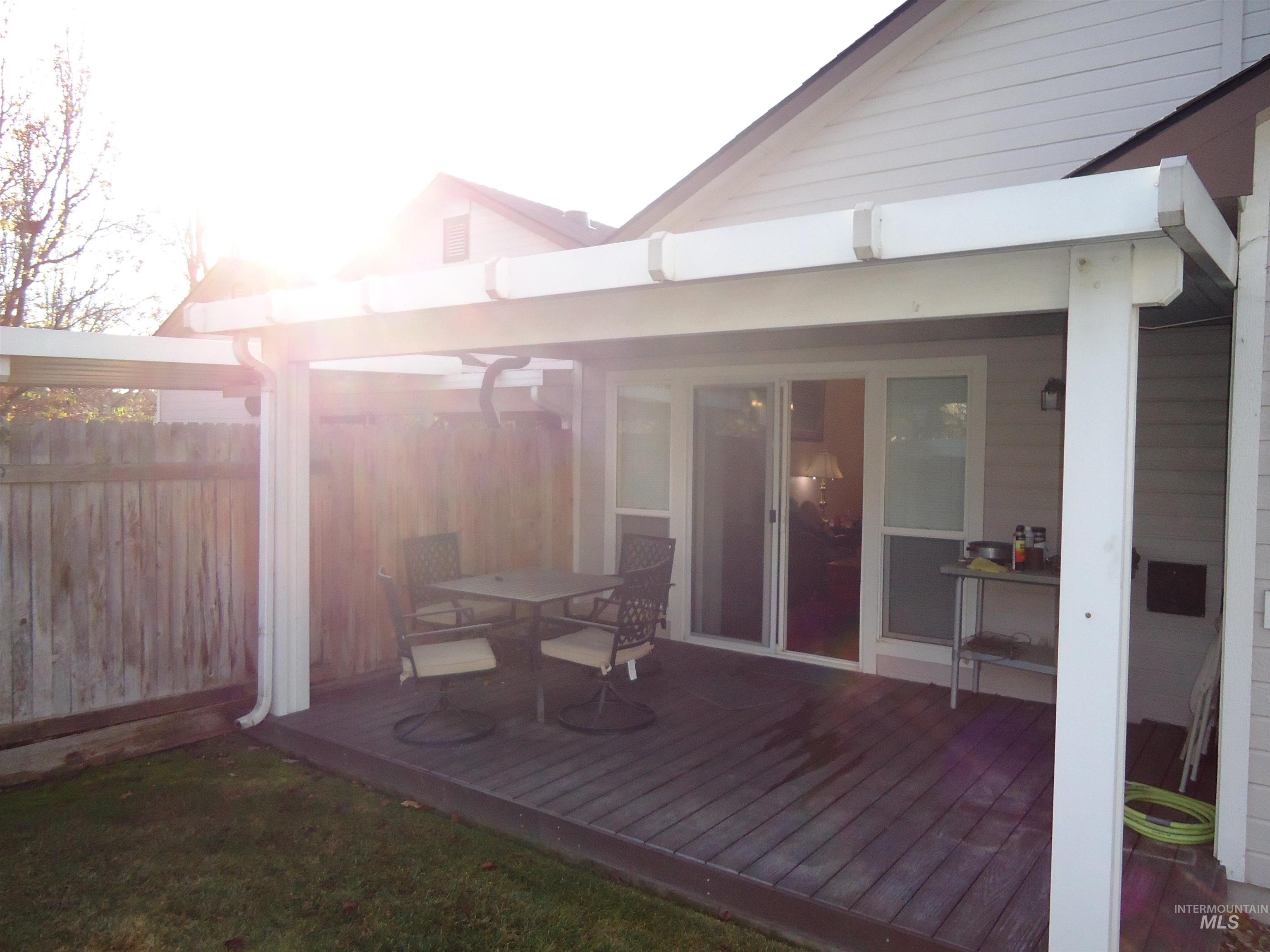 2734 North Turnberry Way Meridian, ID 83646 - Photo 17 of 18 Wooden terrace with outdoor dining area