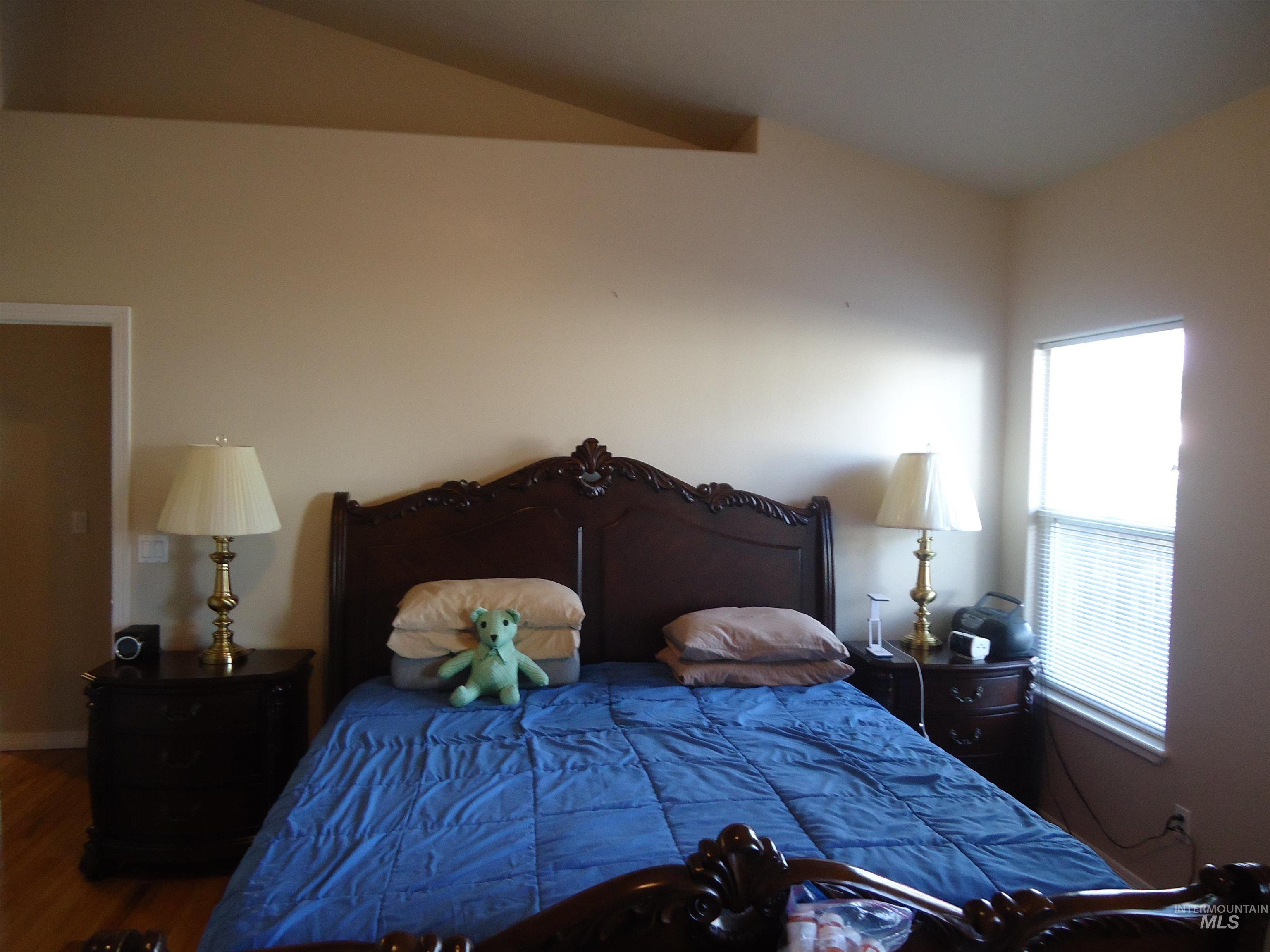 2734 North Turnberry Way Meridian, ID 83646 - Photo 7 of 18 Bedroom with wood finished floors