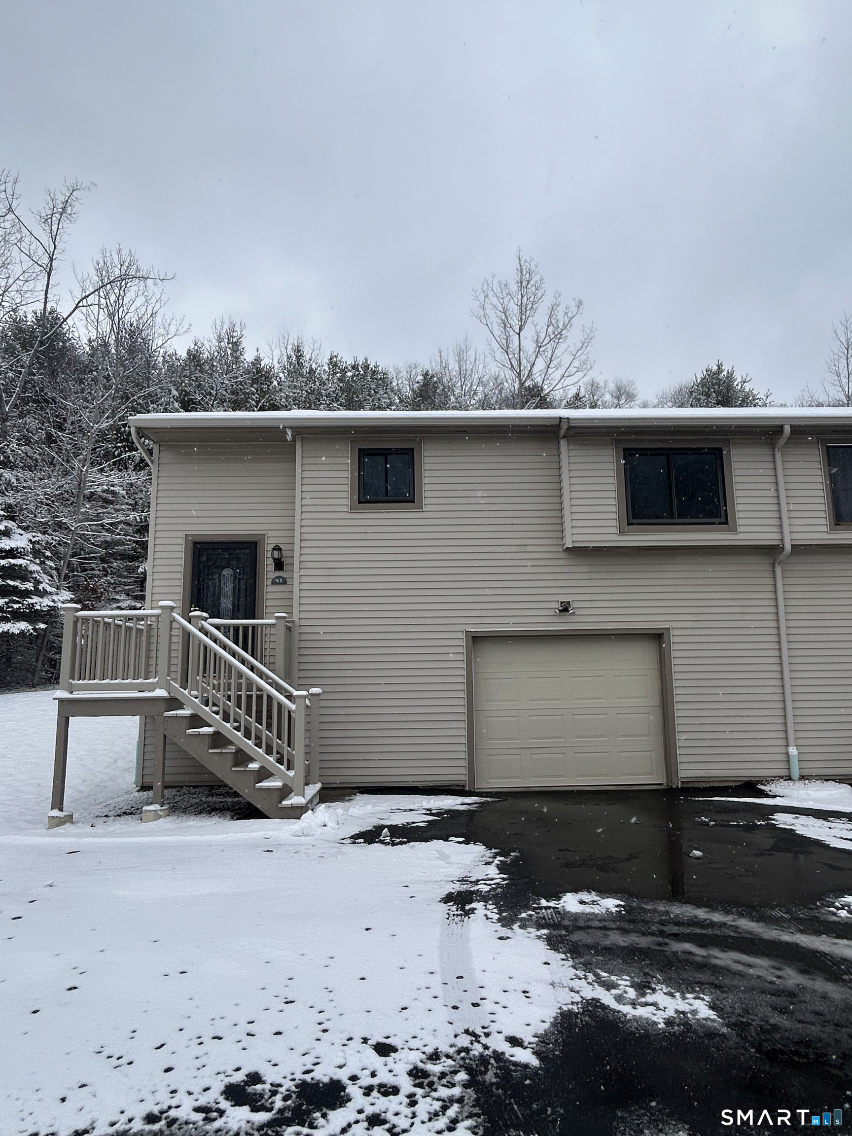 33 Baxter Road, Unit 4A Willington, CT 06279 - Photo 1 of 9 a front view of a house with a yard