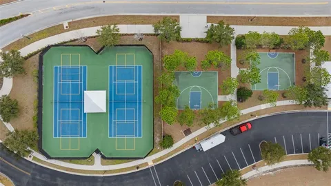 a view of swimming pool from a balcony