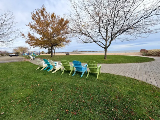 a couple of table and chairs in the garden