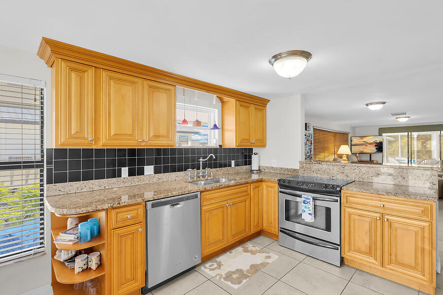 303 Sombrero Beach Road Marathon, FL 33050 - Photo 16 of 84 Side B-loads of kit cabinetry