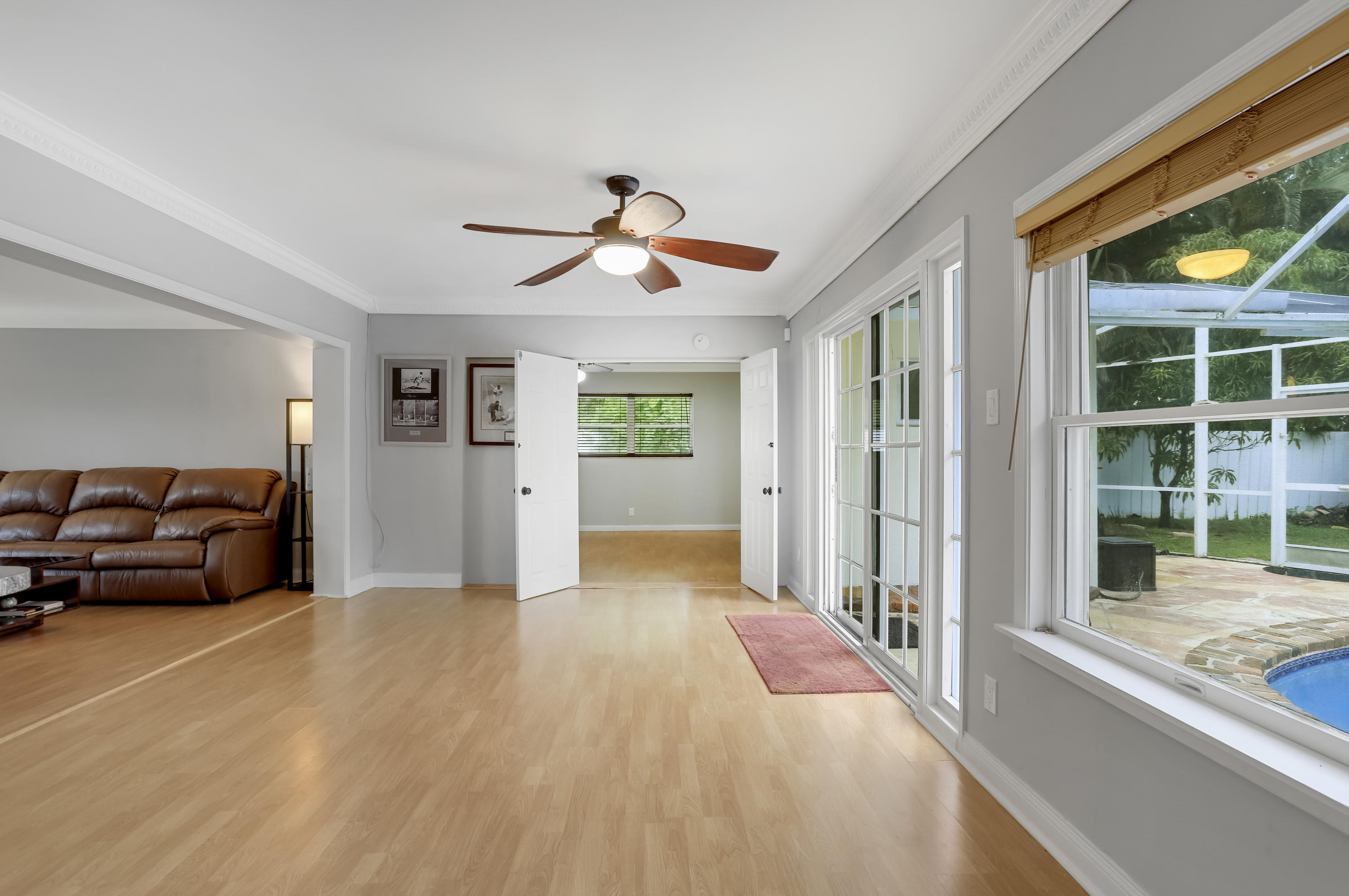 1346 Northwest 4th Street Boca Raton, FL 33486 - Photo 12 of 33 a living room with furniture and a large window