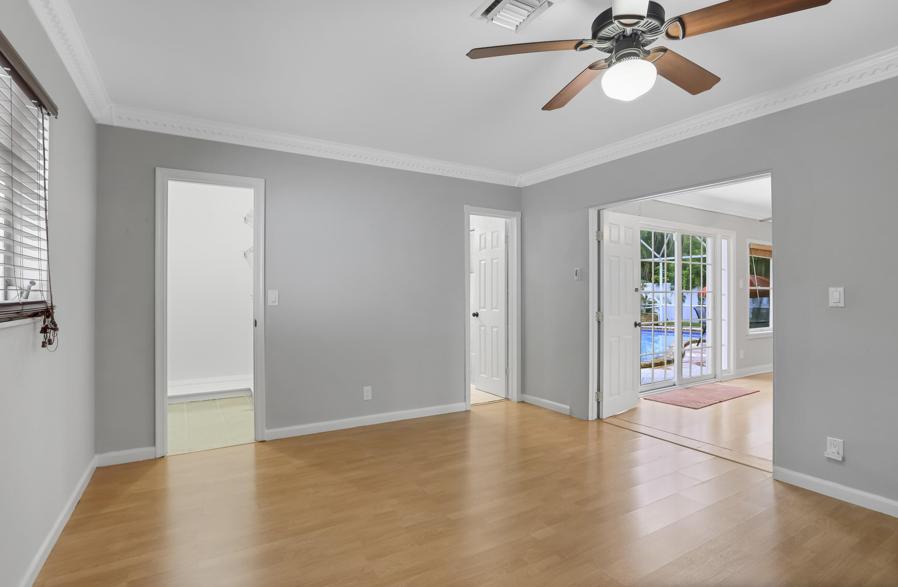 1346 Northwest 4th Street Boca Raton, FL 33486 - Photo 15 of 33 wooden floor in an empty room with a window