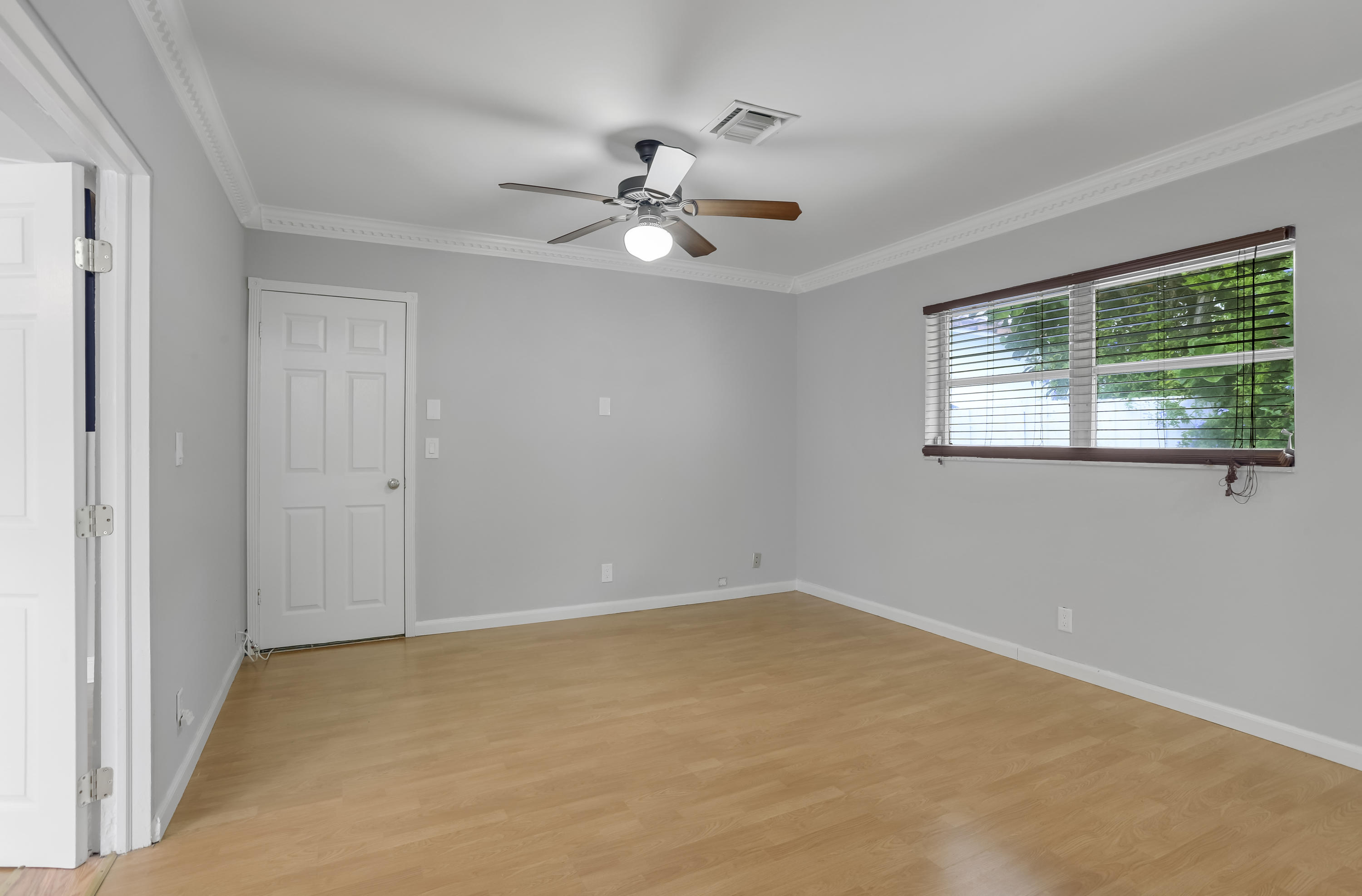 1346 Northwest 4th Street Boca Raton, FL 33486 - Photo 16 of 33 a view of an empty room with a window