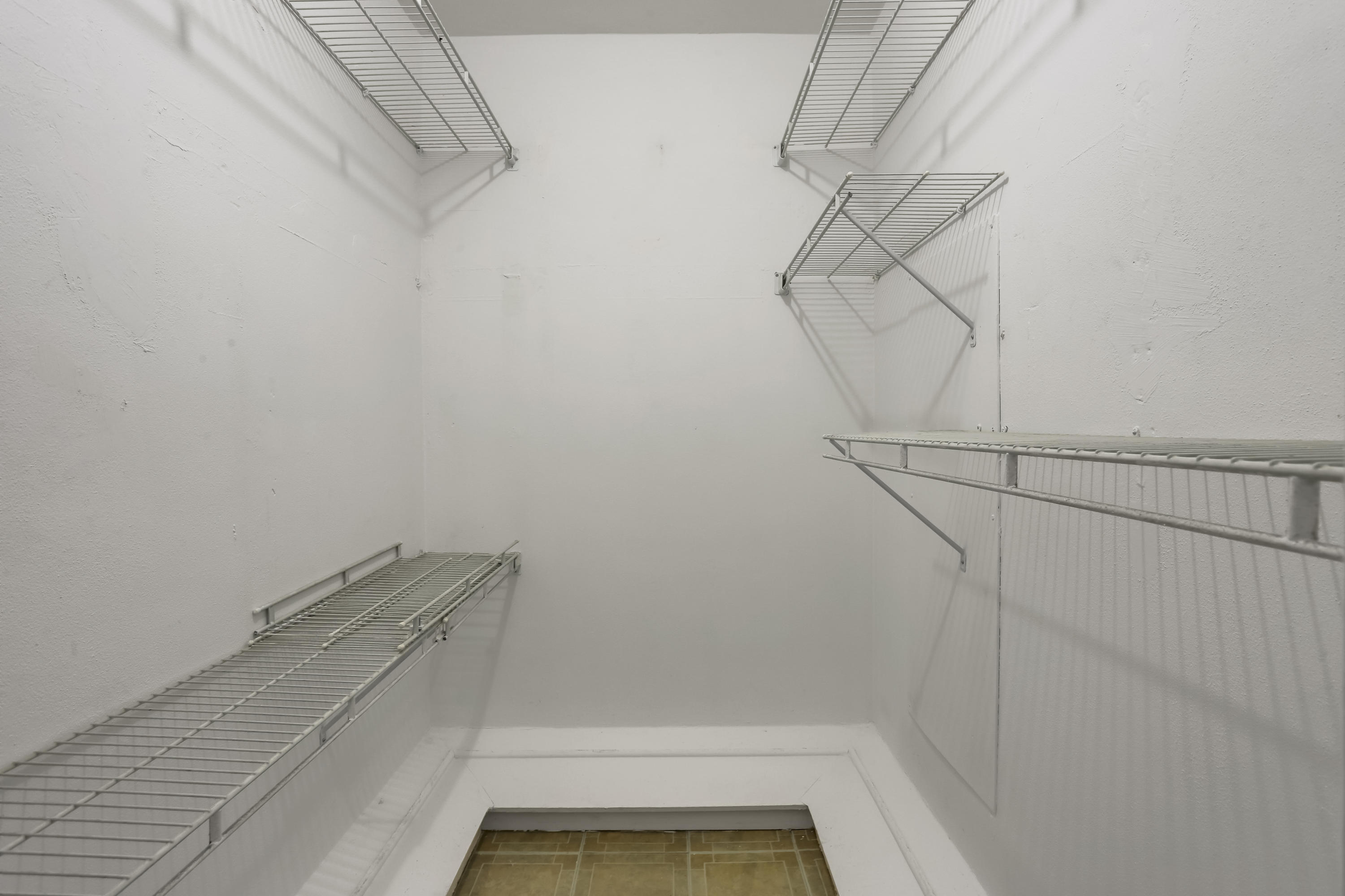 1346 Northwest 4th Street Boca Raton, FL 33486 - Photo 18 of 33 a view of small space with racks on the wall