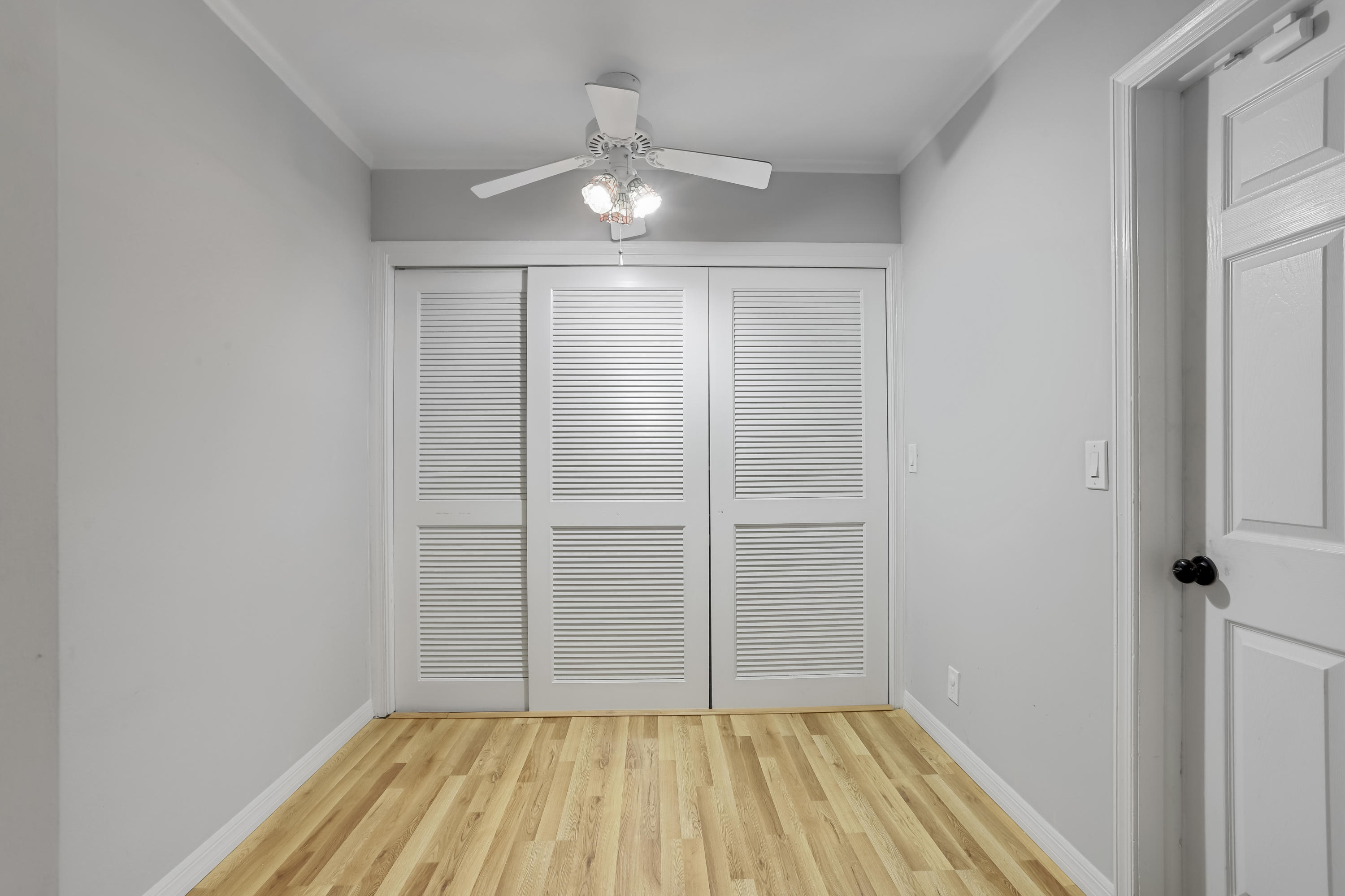 1346 Northwest 4th Street Boca Raton, FL 33486 - Photo 20 of 33 wooden floor in an empty room and a window