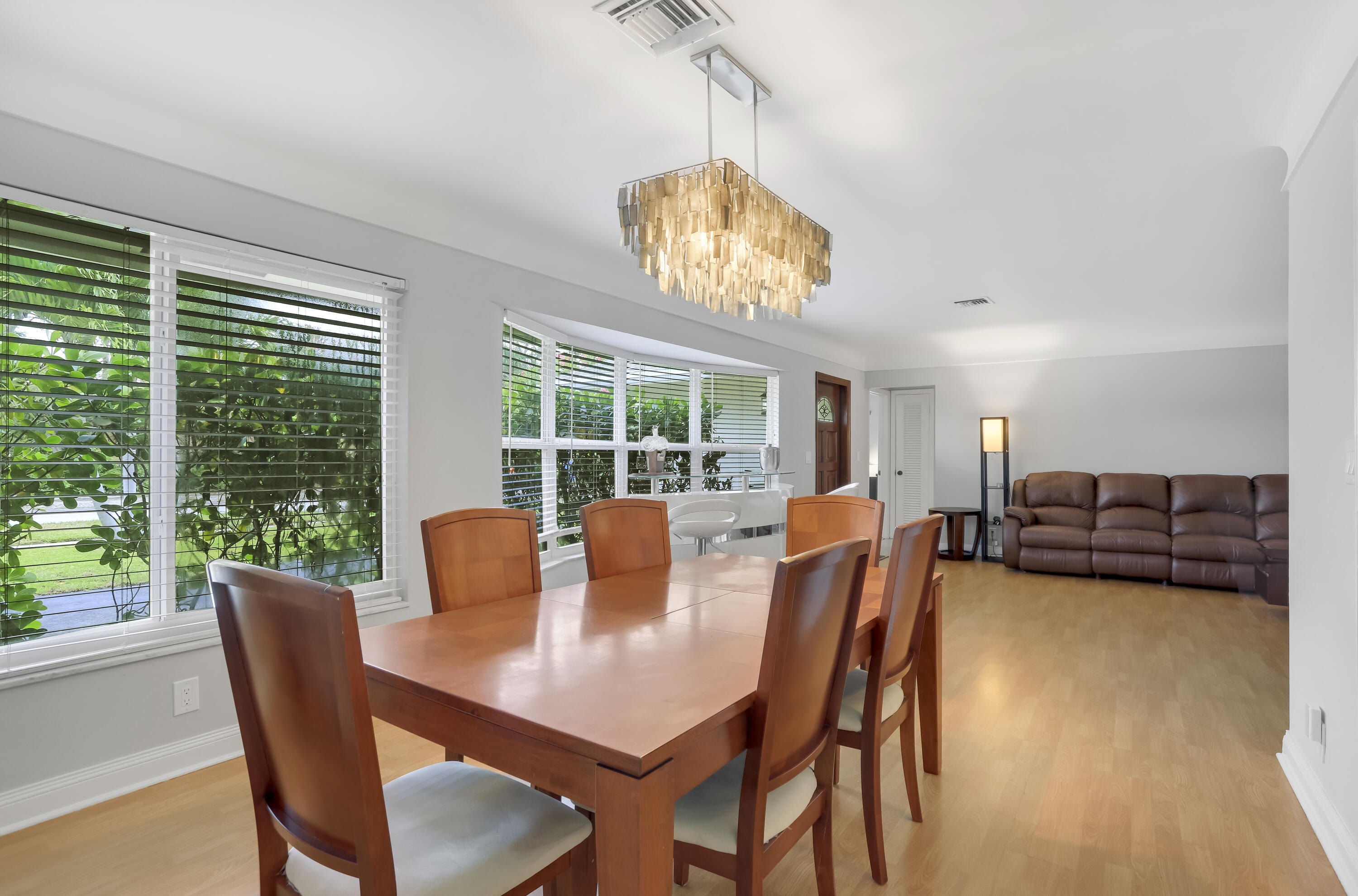 1346 Northwest 4th Street Boca Raton, FL 33486 - Photo 7 of 33 a view of a dining room with furniture window and outside view