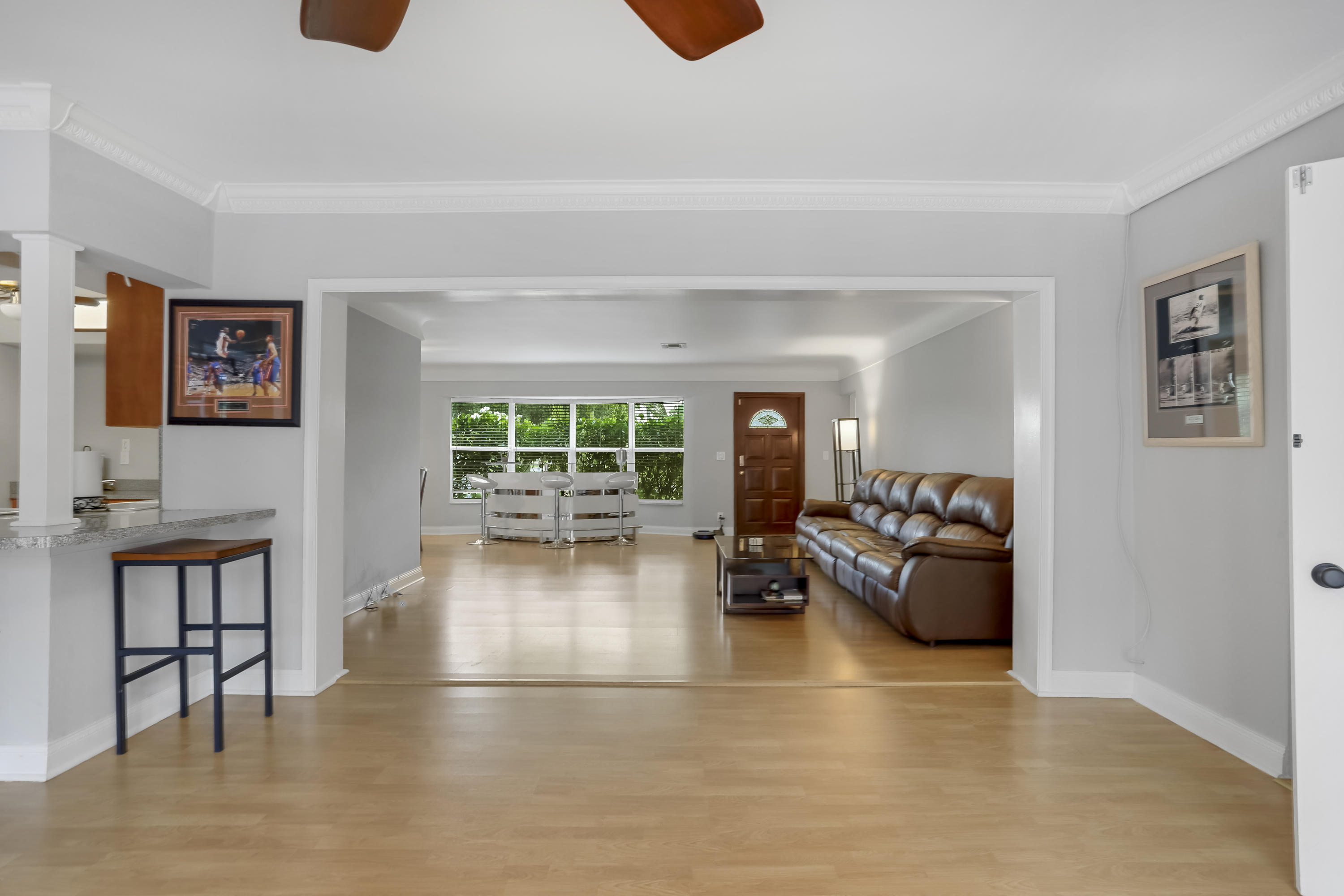 1346 Northwest 4th Street Boca Raton, FL 33486 - Photo 9 of 33 a living room with furniture and a large window