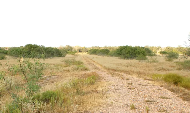 a view of mountain with lake view