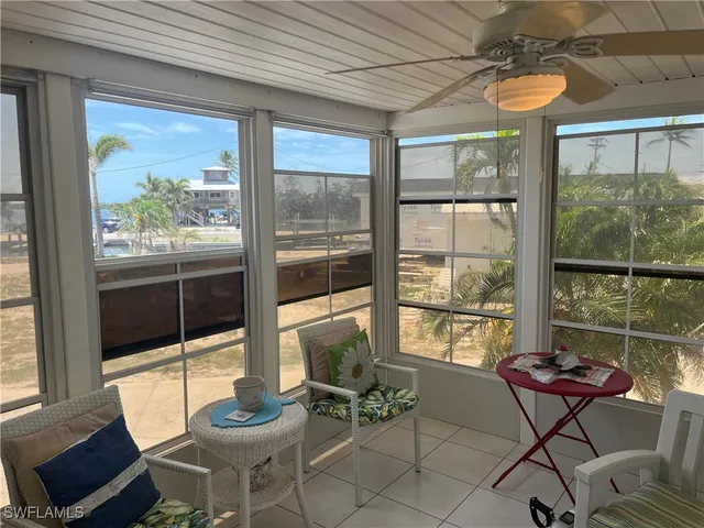 a kitchen with stainless steel appliances a stove a sink and a refrigerator