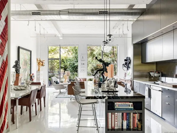 a kitchen with a stove and cabinets