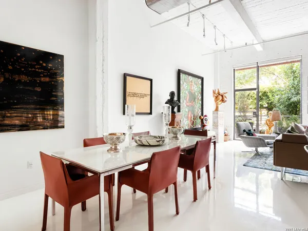 a view of a dining room with furniture