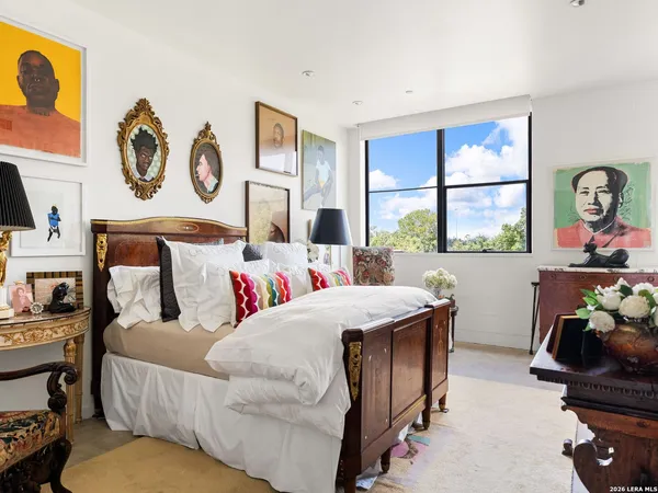 a living room with a couch and a window