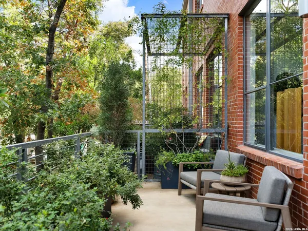 a view of chair and table in patio
