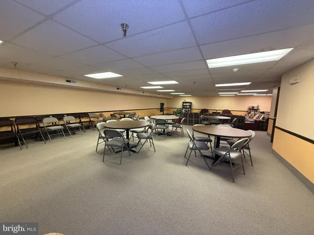a group of people sitting in a room